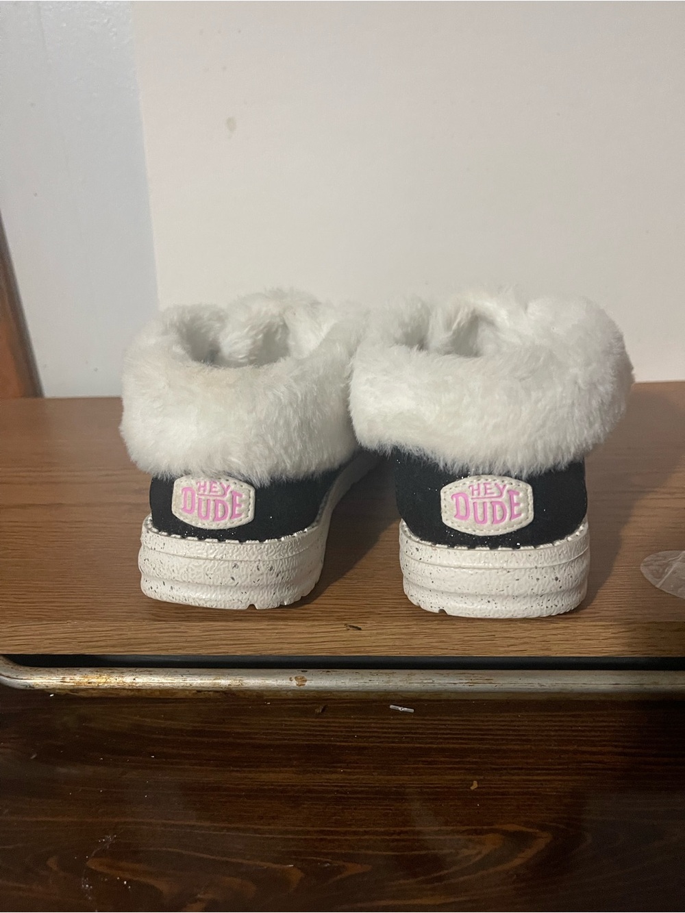 Hey Dude Kids Black Slip-On Shoes with White Faux-Fur Collar and Pink Logo